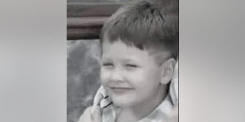 boy photographed playing in dust pile dies moments later tragic