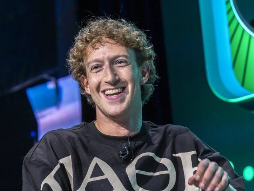 Mark Zuckerberg flashes a smile