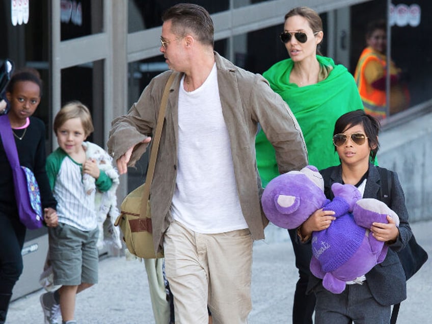 LOS ANGELES, CA - FEBRUARY 05: Brad Pitt and Angelina Jolie are seen after landing at Los