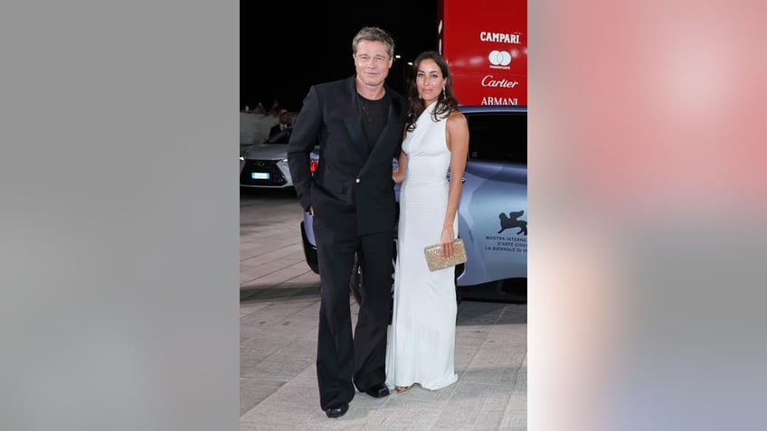 Brad Pitt and Ines de Ramon at the Venice Film Festival premiere of "Wolfs"