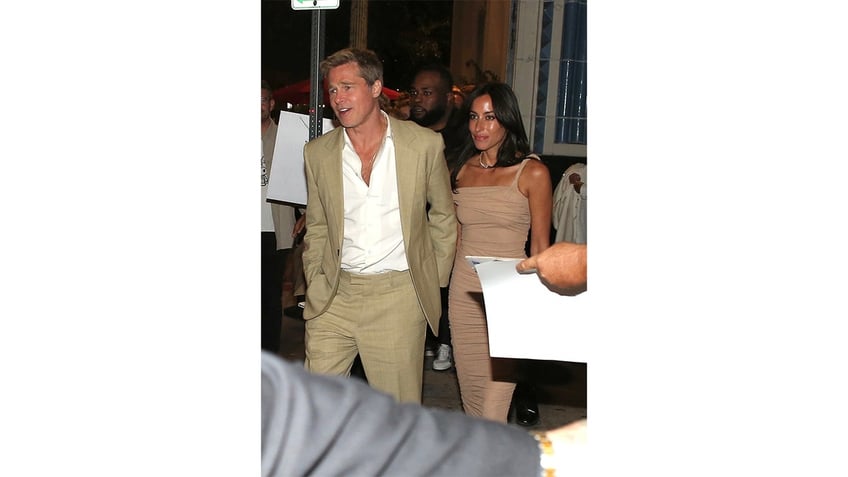 Brad Pitt and Ines De Ramon leave dinner