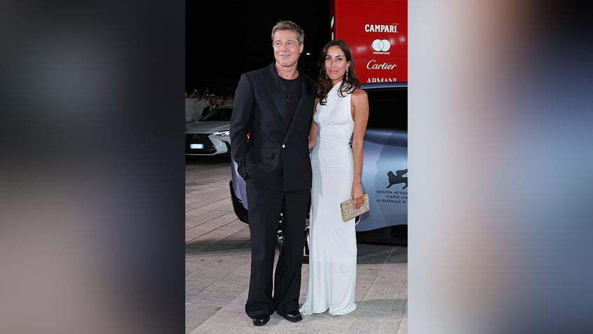 Brad Pitt and Ines de Ramon at the Venice Film Festival.