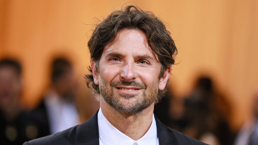 Bradley Cooper at the Met Gala soft smiles