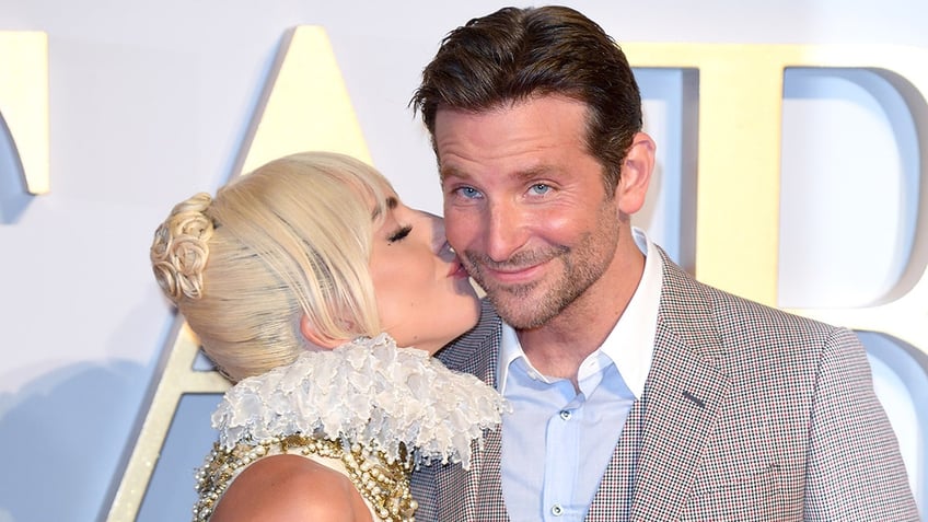 Lady Gaga kisses Bradley Cooper on the cheek