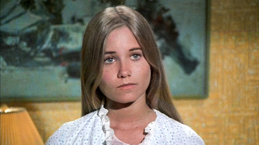 Maureen McCormick as Marcia Brady