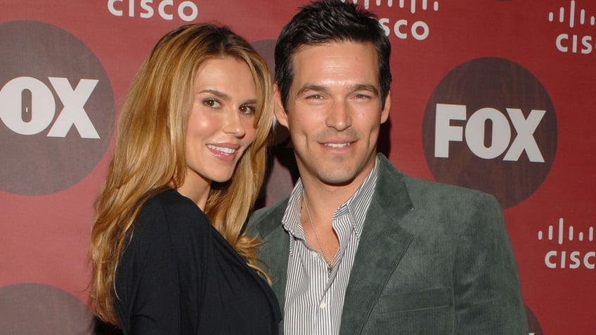 Brandi Glanville red carpet with Eddie Cibrian