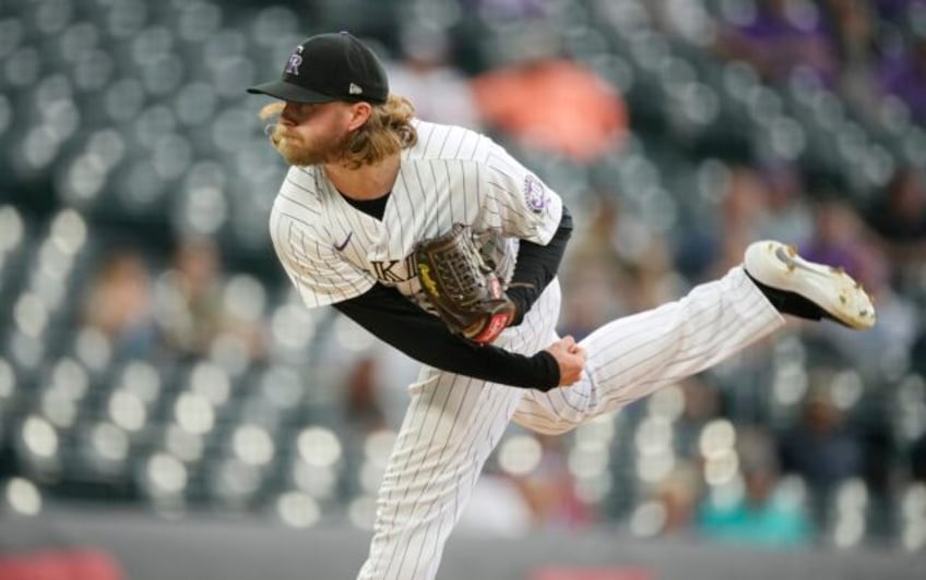 braves land relievers pierce johnson and taylor hearn in trades with rockies and rangers