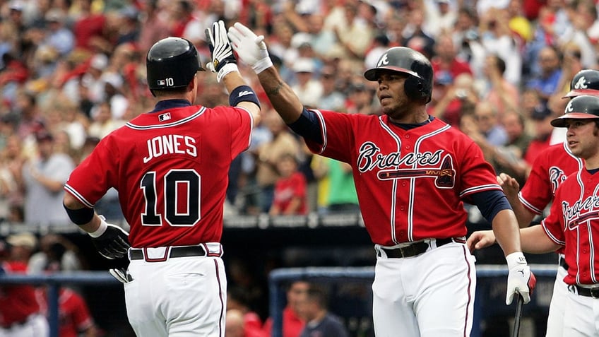 Chipper and Andruw Jones after home run