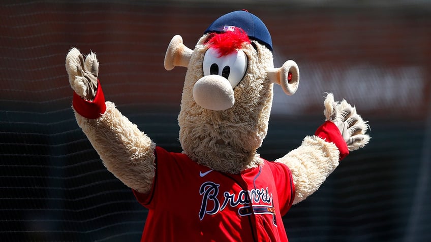 braves mascot channels derrick henry with brutal stiff arm on youth football player during vikings halftime