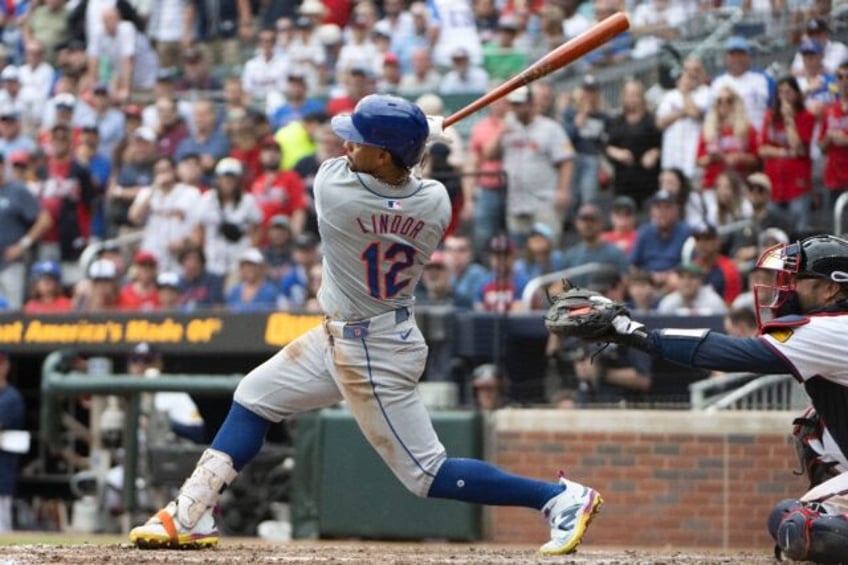 Francisco Lindor's blasts a two-run home run in the ninth inning against Atlanta to seal t