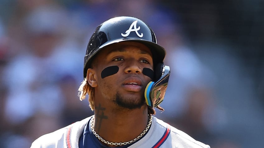 Ronald Acuña Jr. looks on field