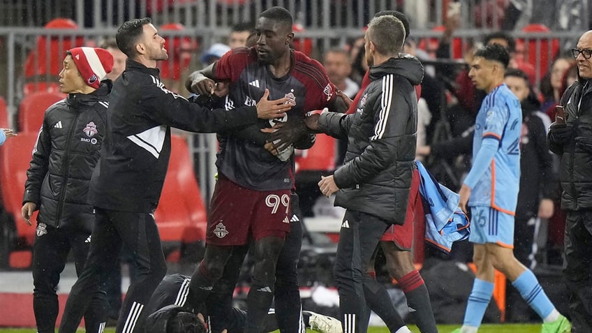 Toronto FC's Osei Owusu held back during brawl