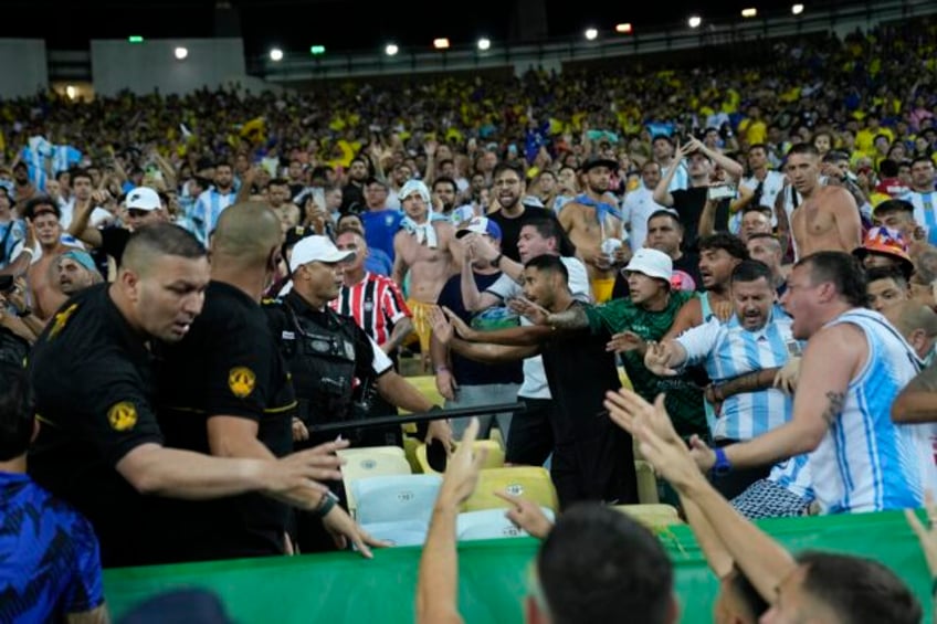 brawling fans in stands delay start of argentina brazil world cup qualifying match for 27 minutes