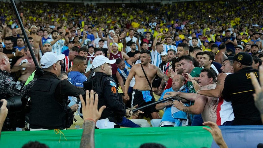 brazil argentina world cup qualifier delayed after fans brawl in stands