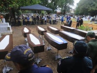 Brazilian authorities bury deceased migrants who drifted in African boat to the Amazon