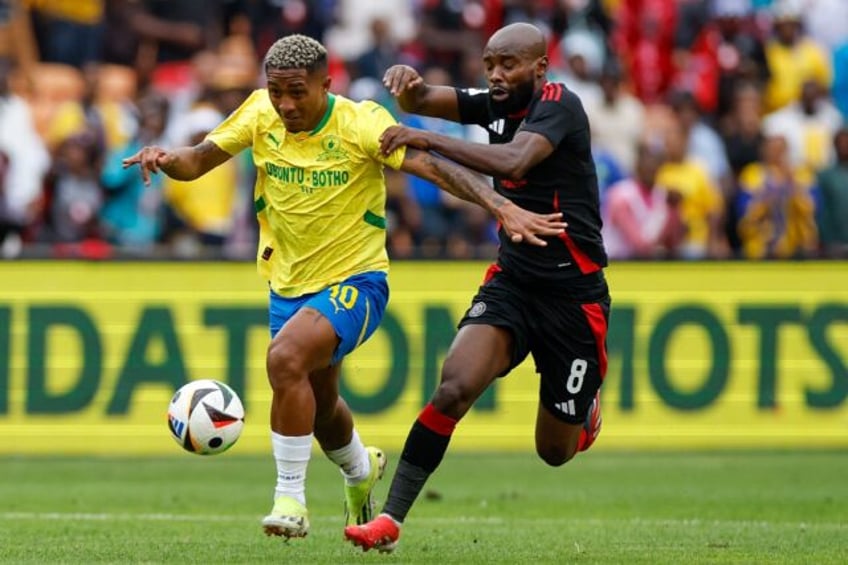 Brazilian forward Lucas Ribeiro (L) in action for South African champions Mamelodi Sundown