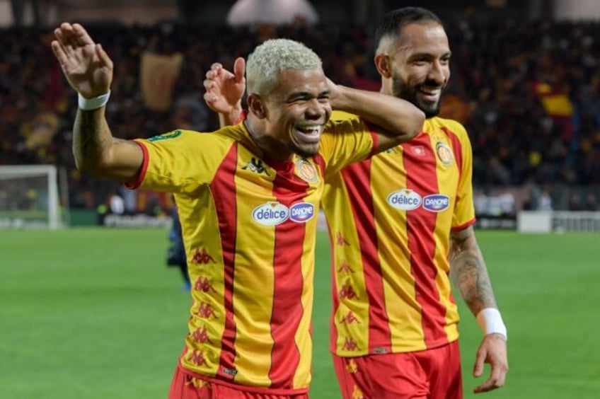 Yan Sasse (L) celebrates scoring for Esperance of Tunisia against Mamelodi Sundowns of Sou