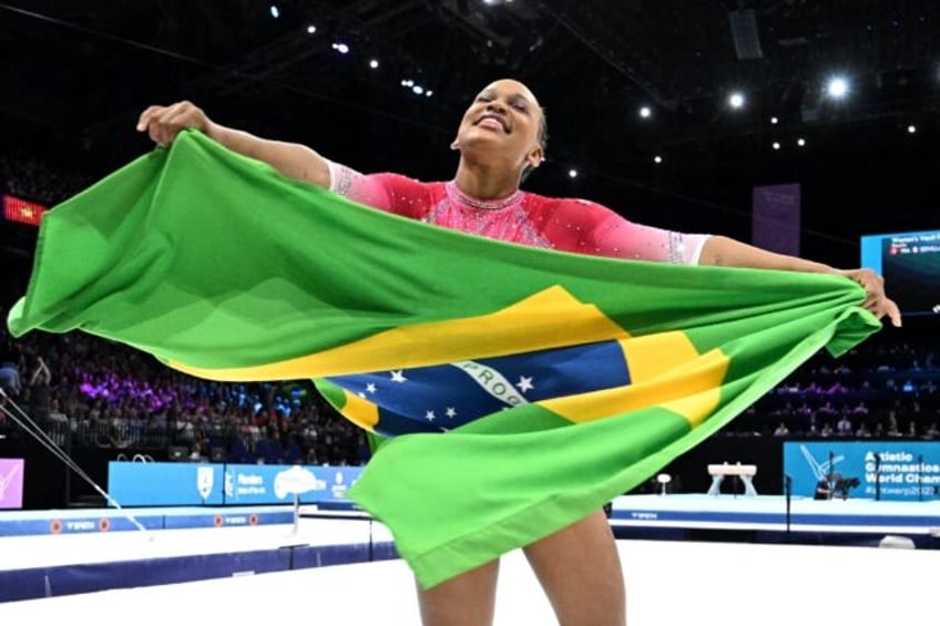 brazils andrade reigns on vault as biles falls to silver