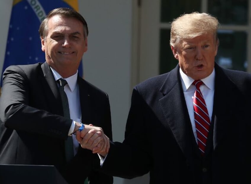 Brazilian ex-president Jair Bolsonaro (left) says he was rooting for Donald Trump in the