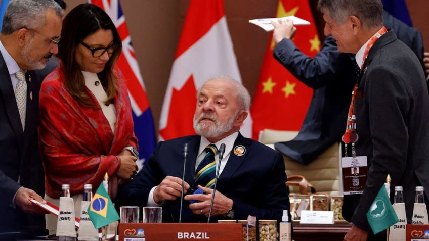 brazils lula says putin can freely attend the 2024 rio de janeiro g20 no way he will be arrested