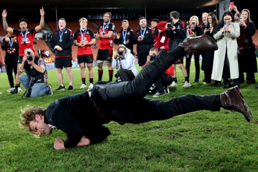 Scott Robertson celebrates with some break dance moves after Canterbury Crusaders won the