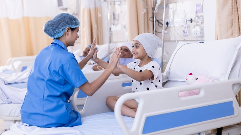 Child patient with nurse