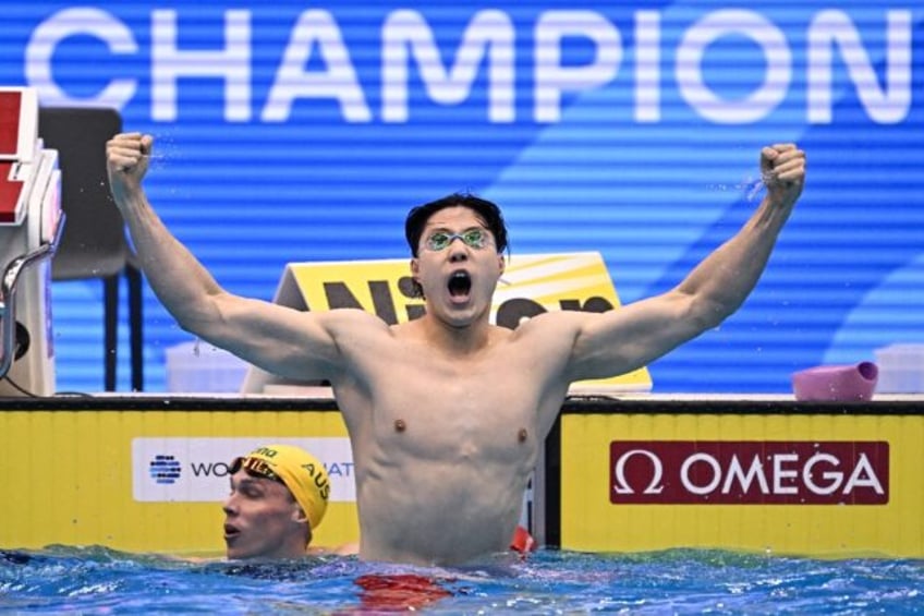 breaststroke sensation qin leads china swimming charge at asian games