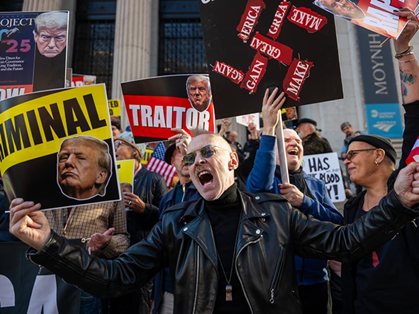 Anti-Trump protesters gather as people line up to see Republican presidential nominee, for