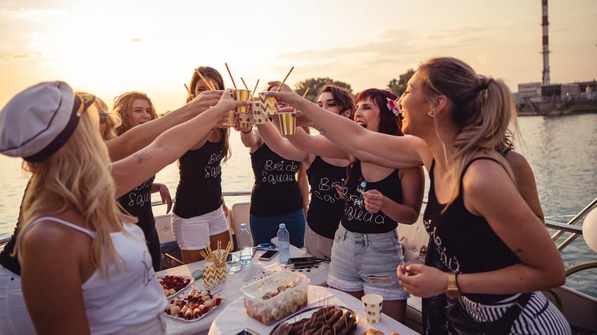 Bachelorette party cheers on boat