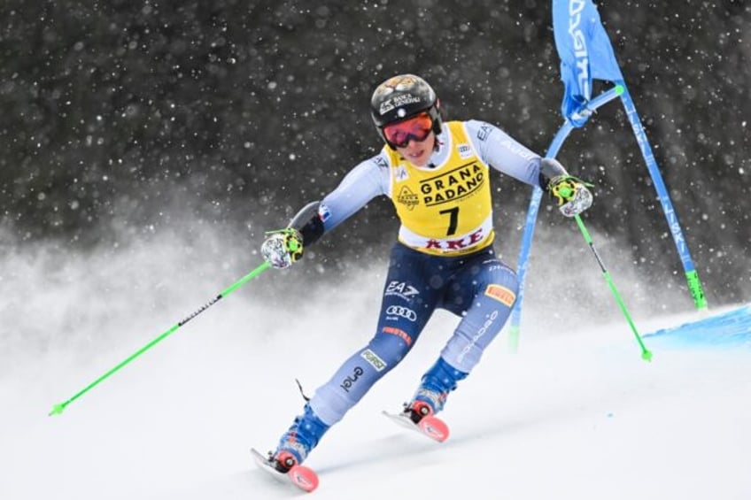 Italy's Federica Brignone kept her World Cup giant slalom title hopes alive with victory i