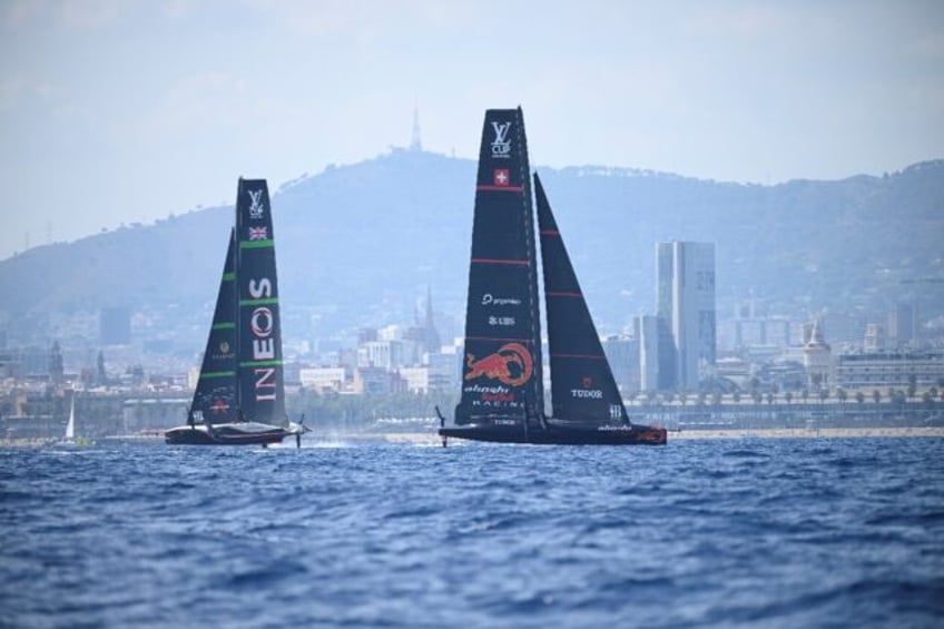 Britain's Ineos Britannia (L) will face off against Switzerland's Alinghi Red Bull (R) in