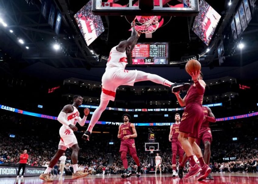 Cameroonian playmaker Pascal Siakam of the Toronto Raptors dunks against the Cleveland Cavaliers in a Raptors' NBA triumph