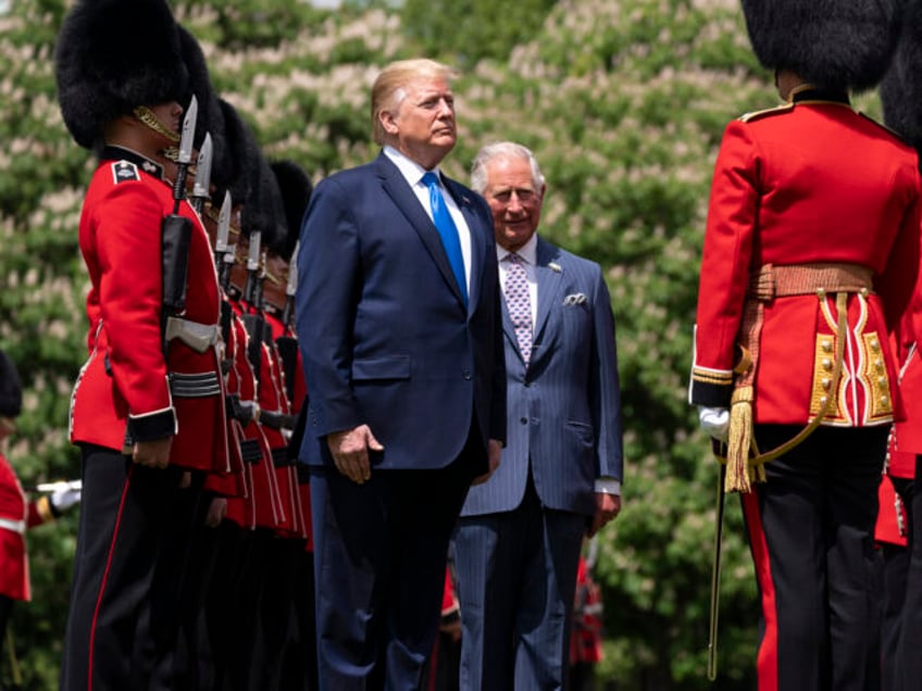 President Donald J. Trump joined by the Prince Charles inspects the Guard of Honor during