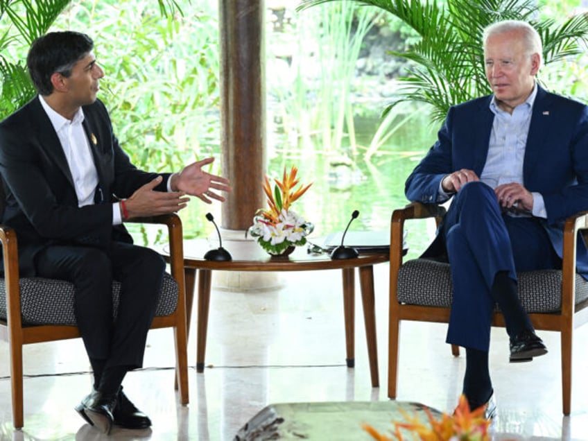 TOPSHOT - US President Joe Biden (R) and British Prime Minister Rishi Sunak hold a meeting on the sidelines of the G20 Summit in Nusa Dua on the Indonesian resort island of Bali, November 16, 2022. (Photo by SAUL LOEB / AFP) (Photo by SAUL LOEB/AFP via Getty Images)