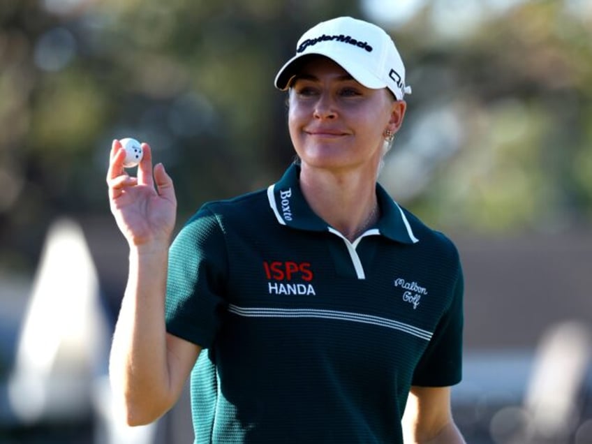 BELLEAIR, FLORIDA - NOVEMBER 16: Charley Hull of England acknowledges the crowd after a pu