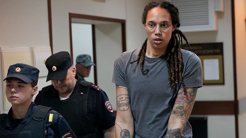 Brittney Griner in handcuffs