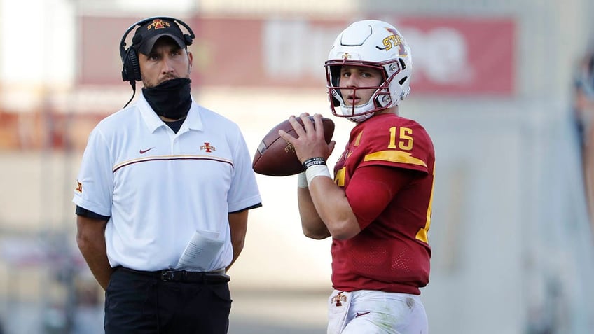 Matt Campbell watches Brock Purdy throw