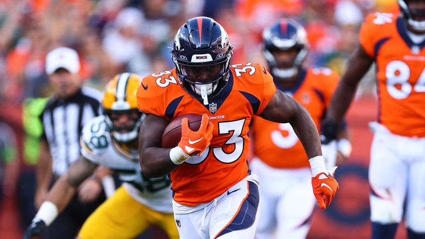 broncos get late field goal interception for victory over packers