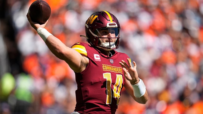 broncos kareem jackson ejected after vicious helmet to helmet hit on commanders logan thomas