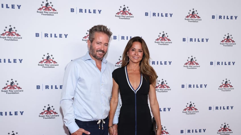 brooke burke and scott rigsby on red carpet