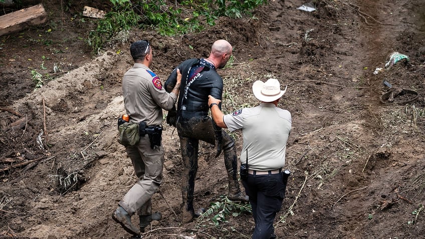 Rescue and search teams in Texas after flash flooding.