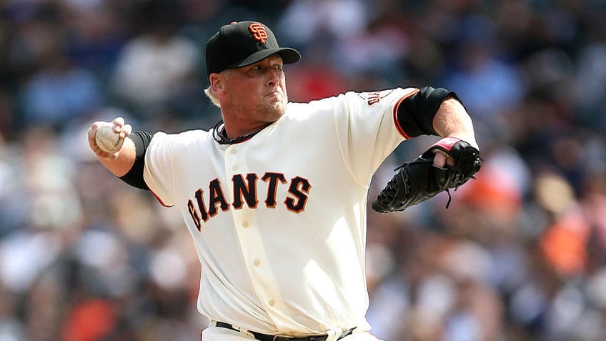 Tyler Walker pitches