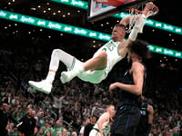 Brown has 22, Porzingis returns with 20 as Celtics open NBA Finals with 107-89 win over Mavericks