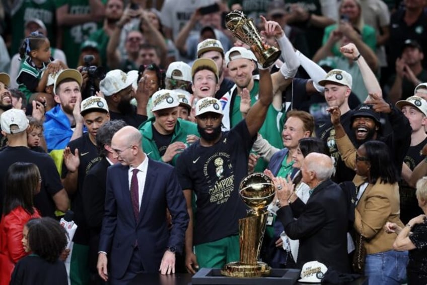 Jaylen Brown of the Boston Celtics holds up the Bill Russell NBA Finals Most Valuable Play