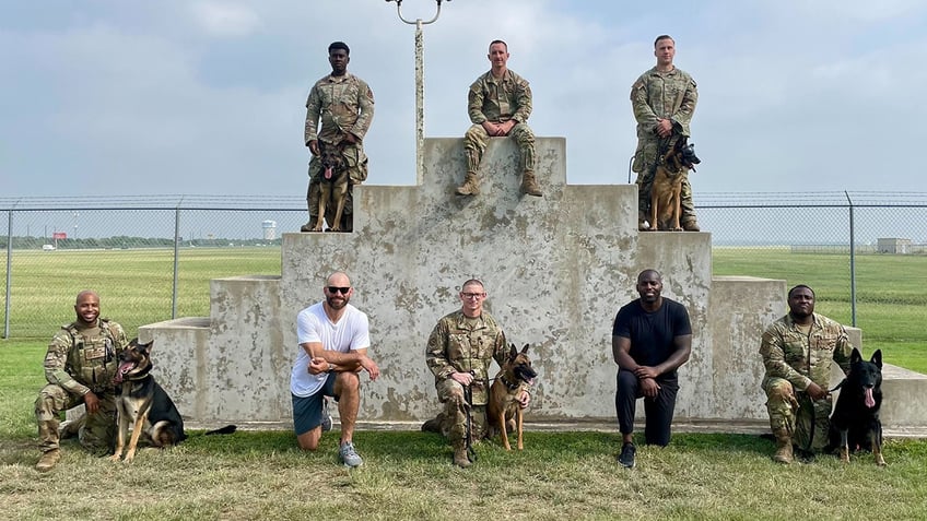 browns legend joe thomas chased down by air force k 9 in wild experience thanks to usaa