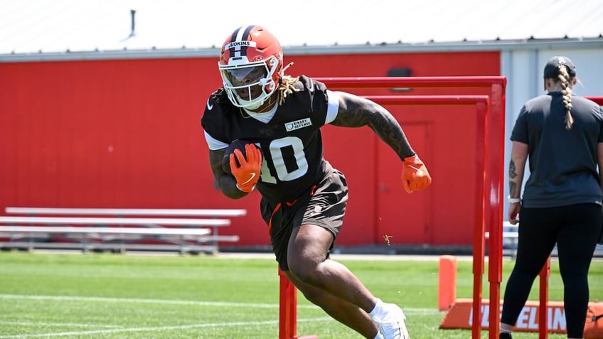 Quinshon Judkins, #10 of the Cleveland Browns, runs a drill during rookie minicamp at CrossCountry Mortgage Campus on May 10, 2025 in Berea, Ohio.