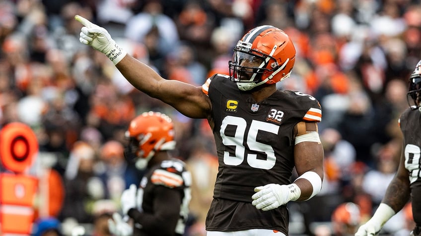 Myles Garrett points on field