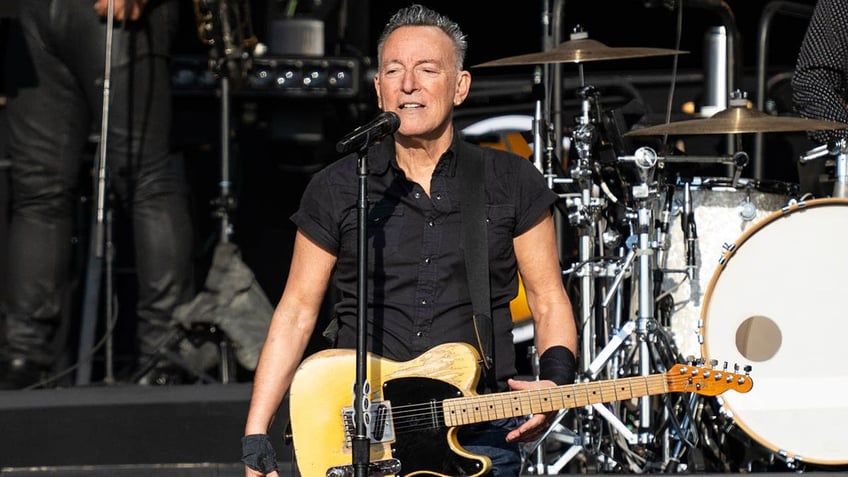 bruce springsteen performing on stage