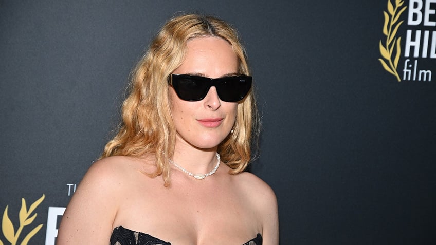 Rumer Willis wearing sunglasses on the red carpet