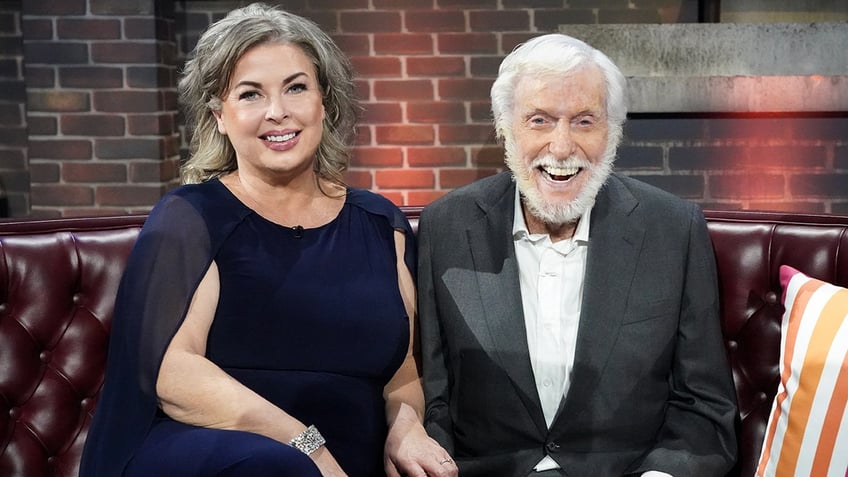 Dick Van Dyke and Arlene Silver sitting down.